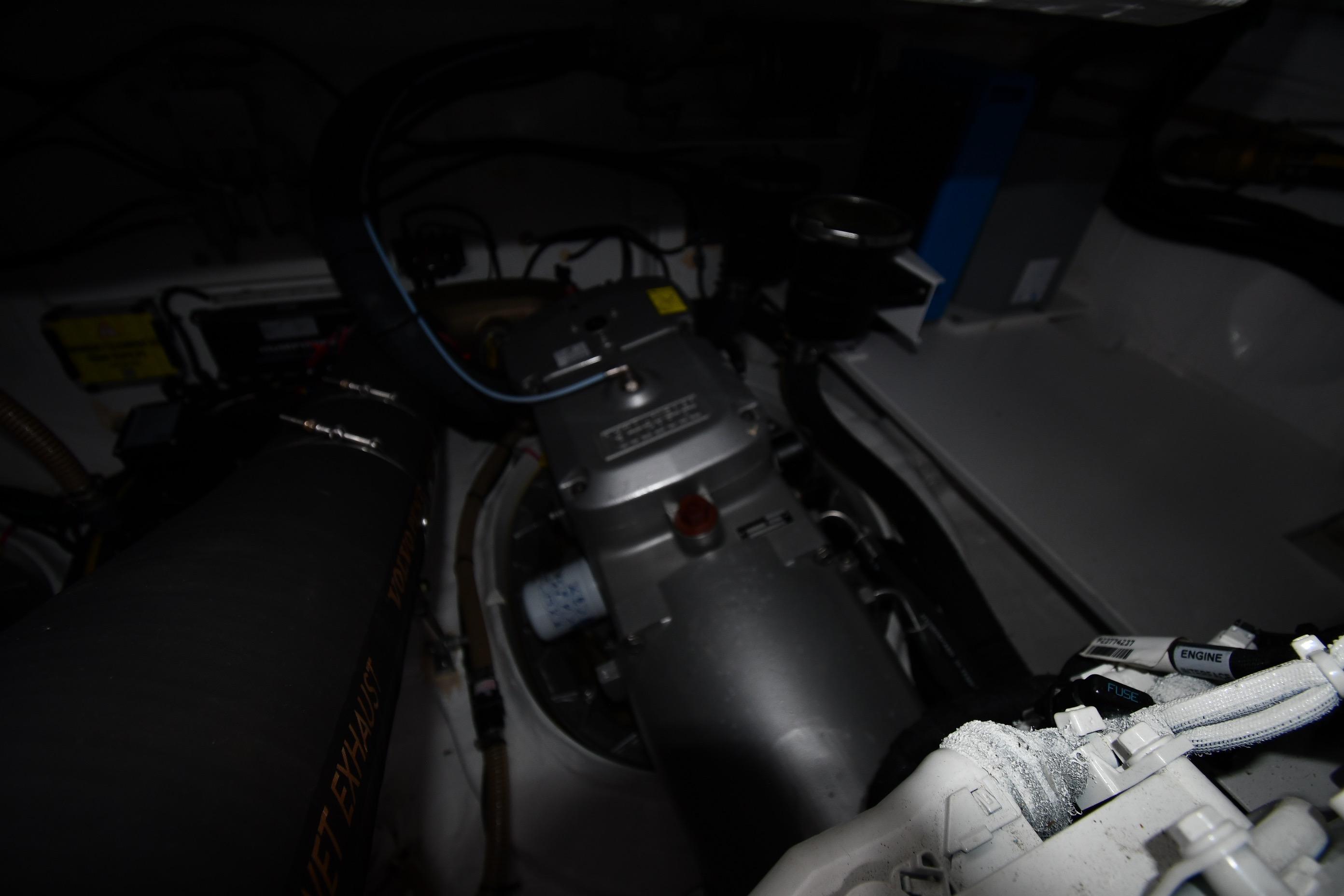 Engine compartment of 2024 Fairline G50 Targa yacht, showcasing mechanical components and wiring.