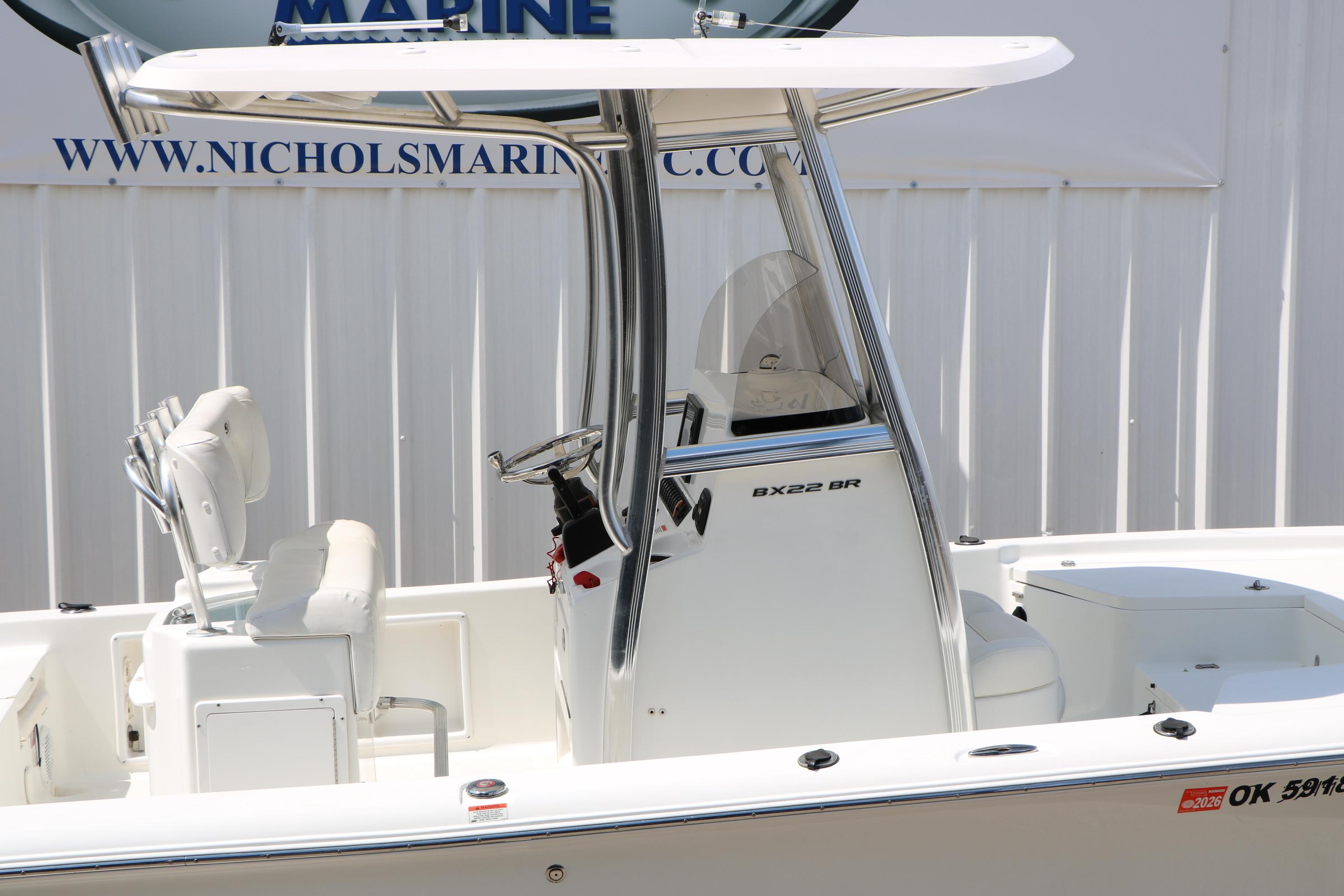 2015 Sea Hunt BX 22 BR boat with T-top and console, side view.