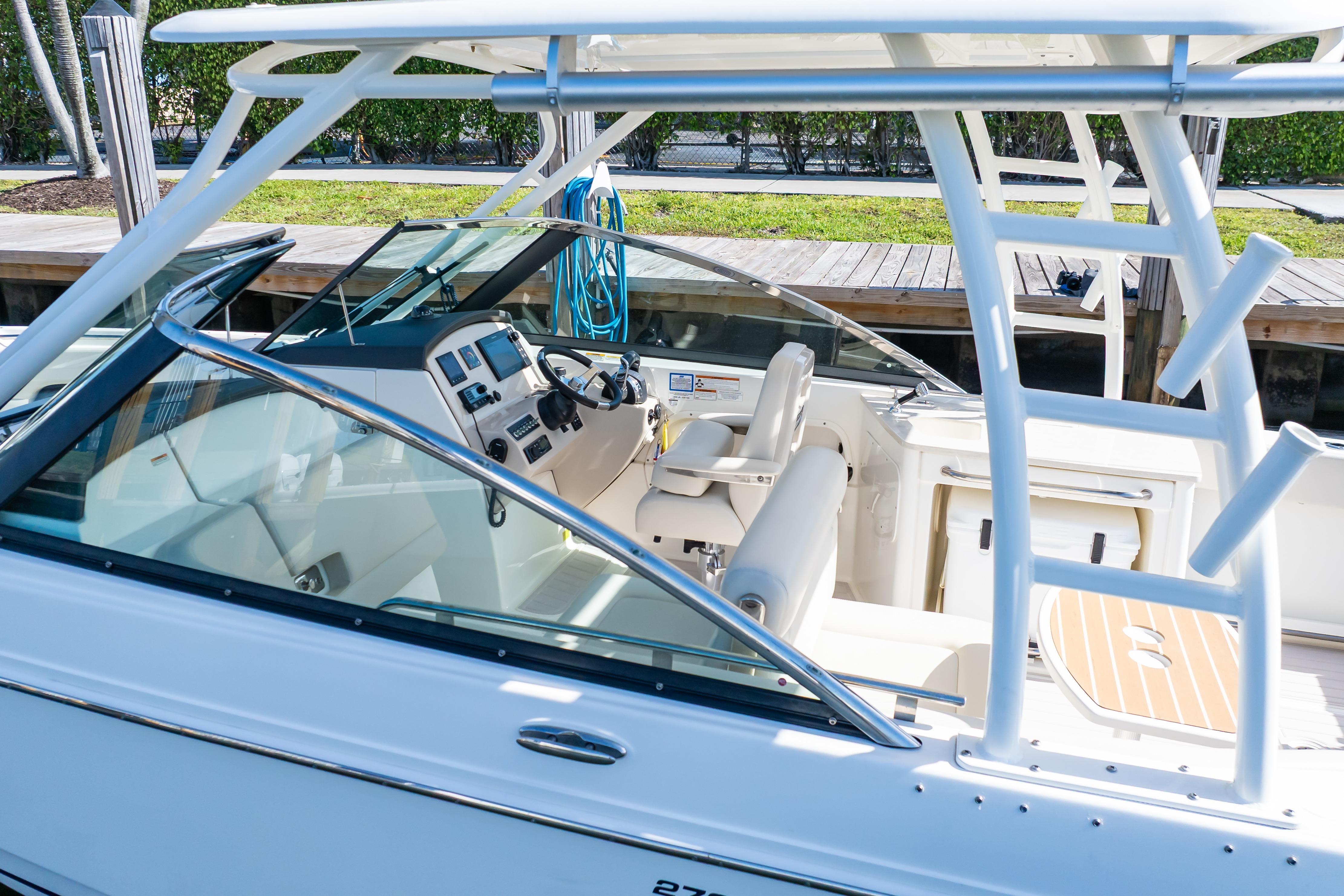 2019 Boston Whaler 270 Vantage boat interior with helm and seating area.