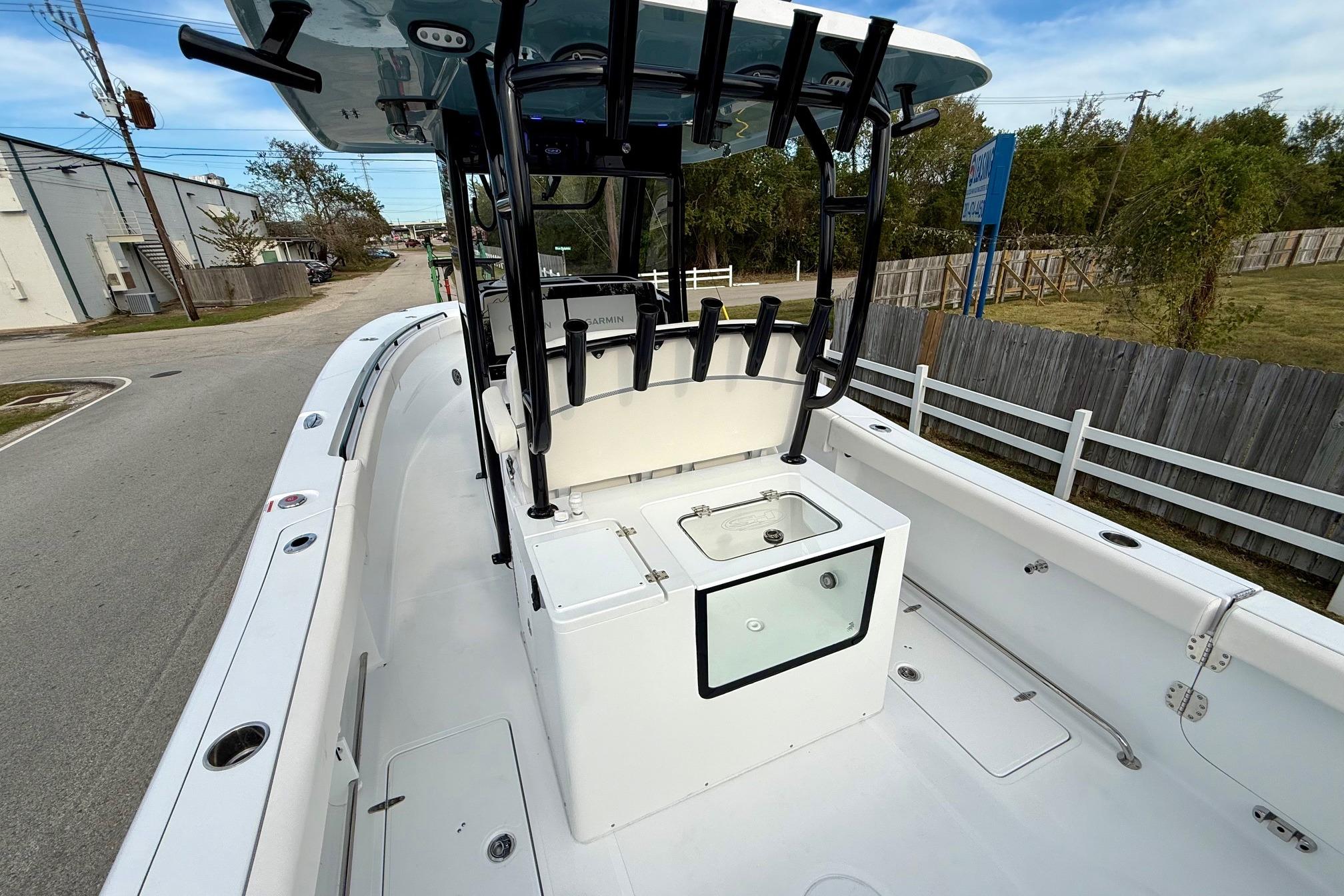 2026 Sea Hunt Gamefish 30 Coffin Box boat interior, featuring spacious deck and storage.