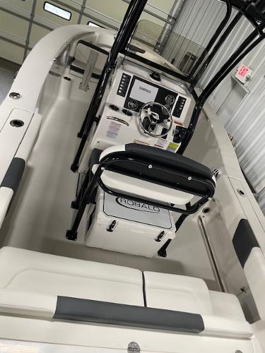 2025 Robalo R202 Explorer boat interior with steering console and seating.