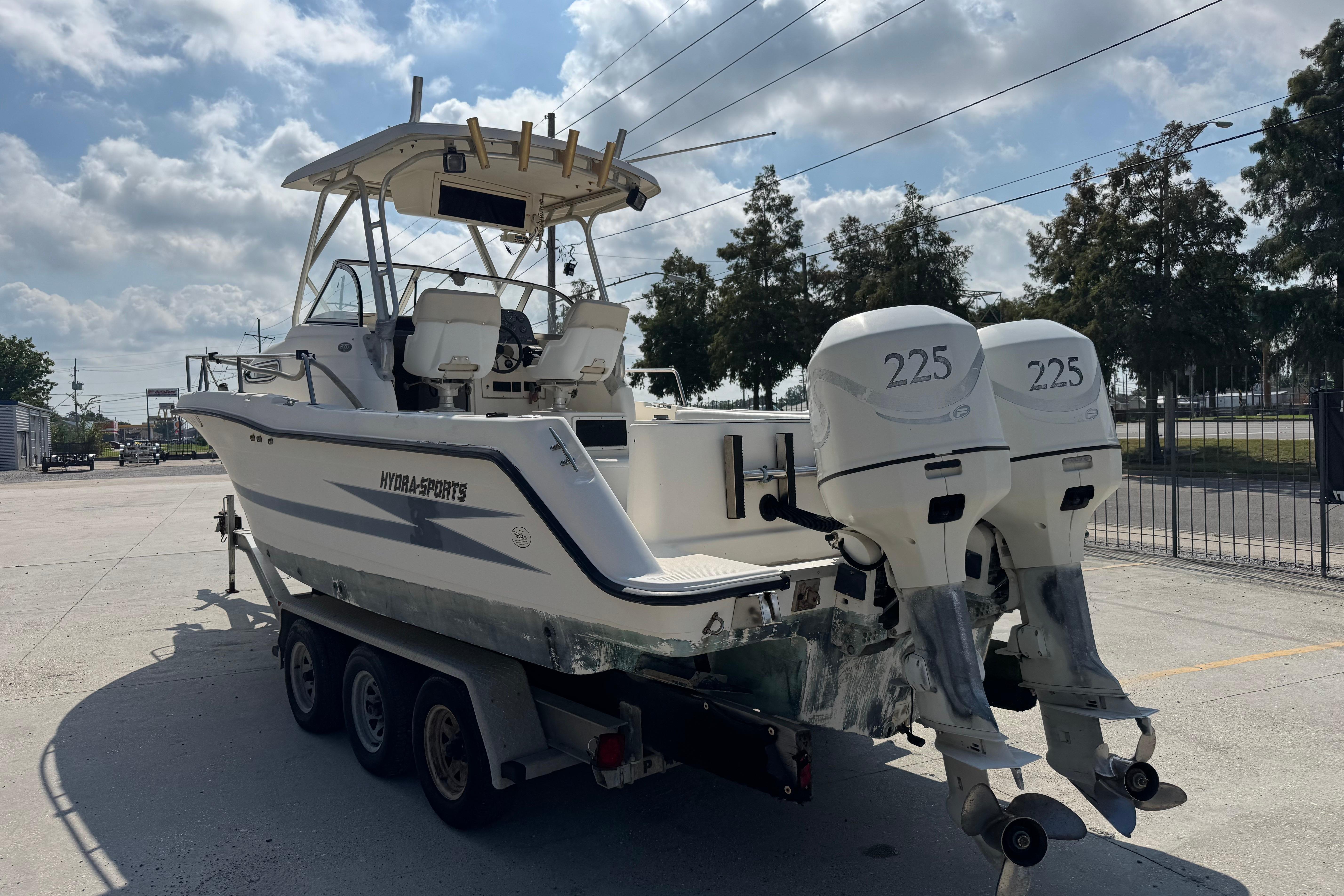 1997 Hydra-Sports VECTOR 2650 WA boat on trailer with twin 225 engines.