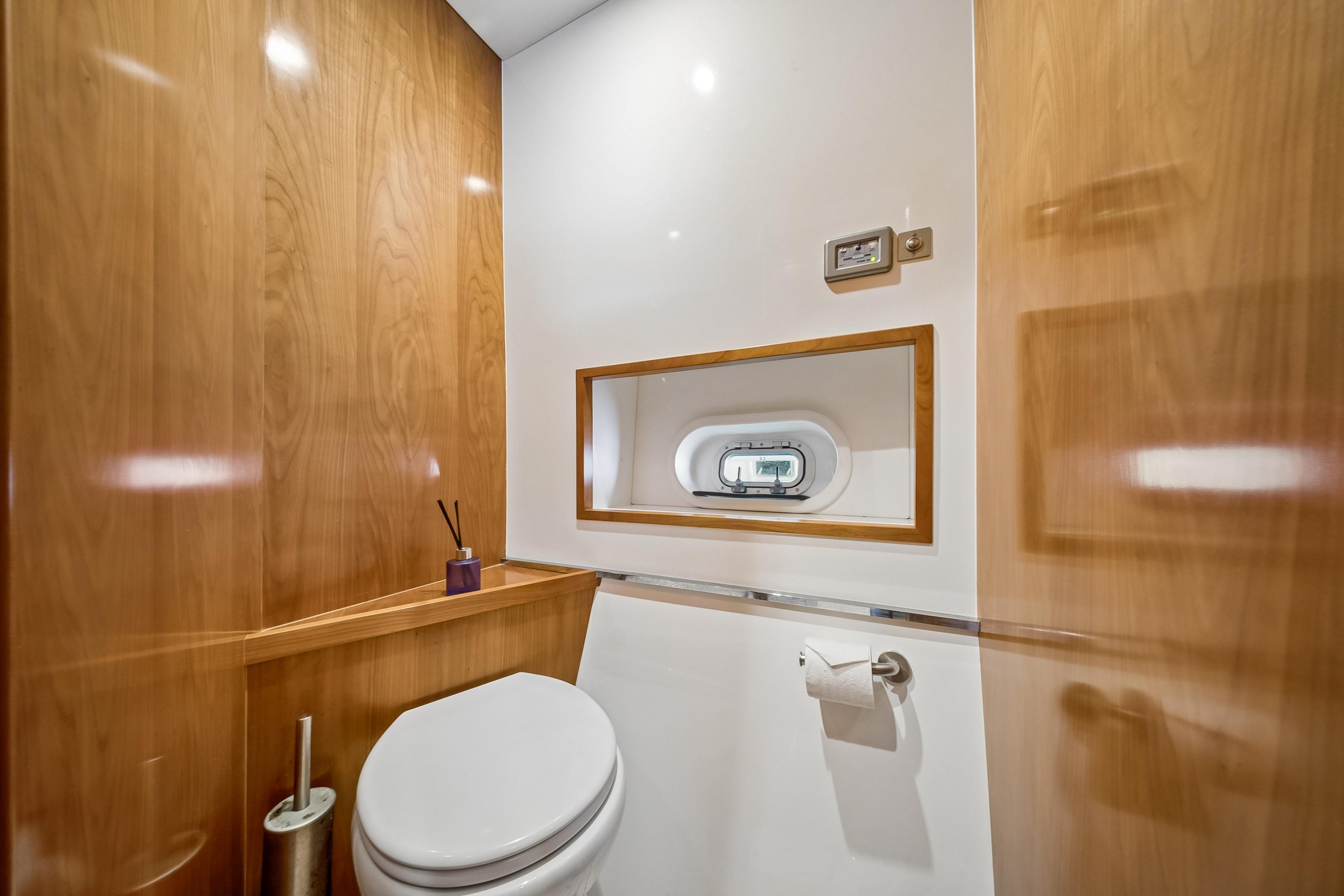 Luxurious wooden bathroom interior on a 2009 Catana 65 yacht.