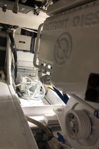Engine room of a 1997 Bertram Convertible boat with Detroit Diesel engine.