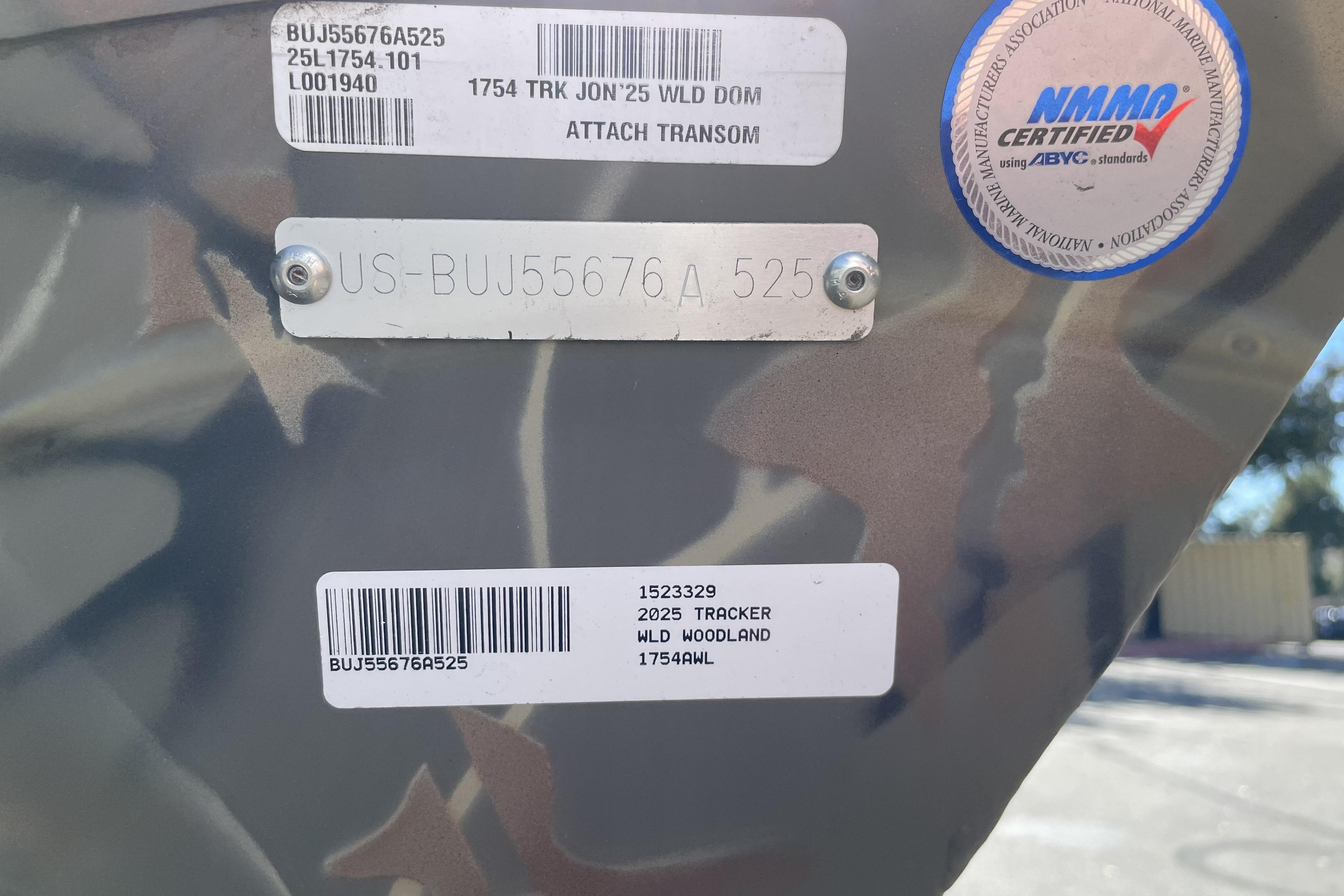 2025 Tracker Grizzly 1754 Jon boat identification labels and certification sticker.