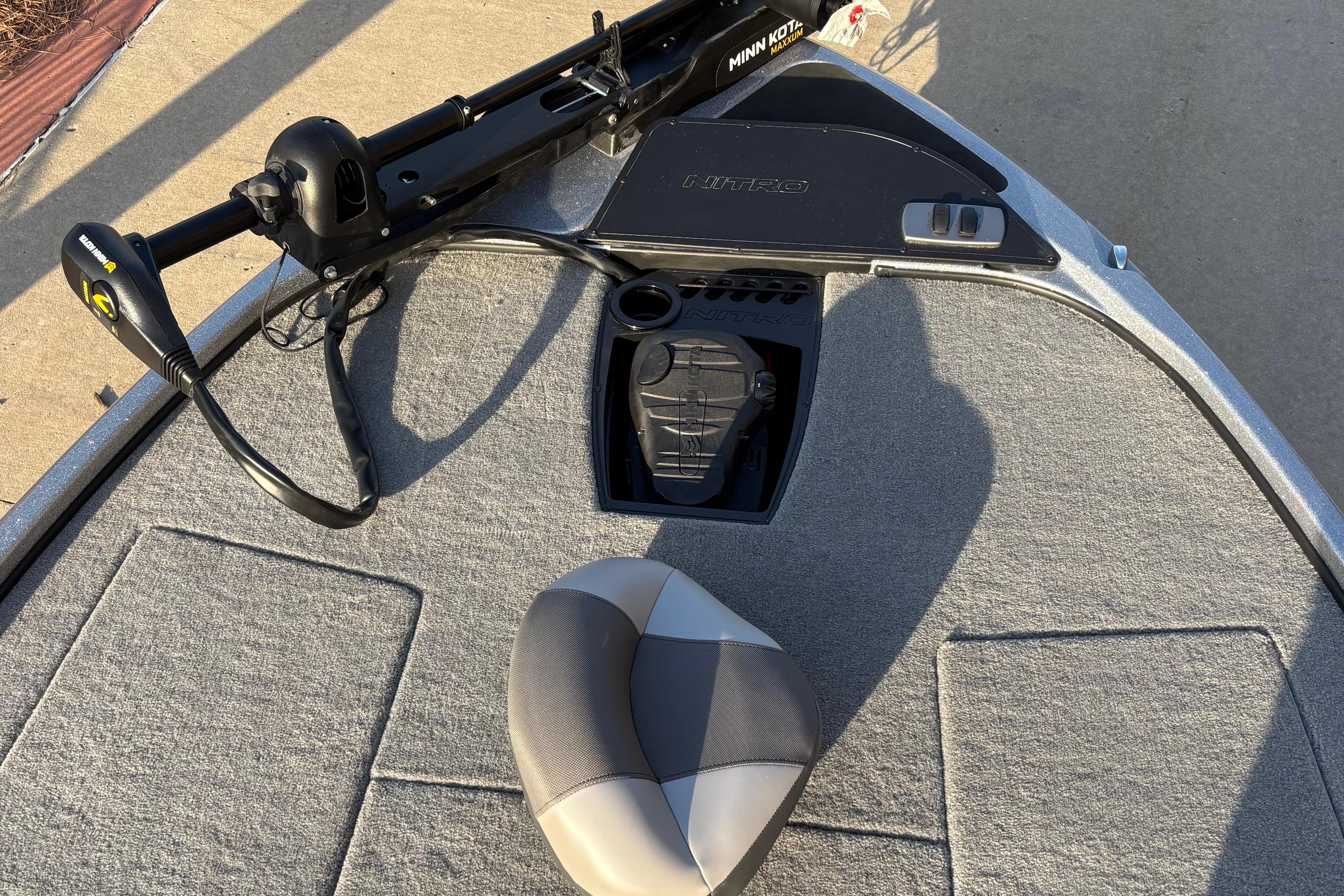 2026 Nitro Z18 boat deck with Minn Kota trolling motor and cushioned seat.
