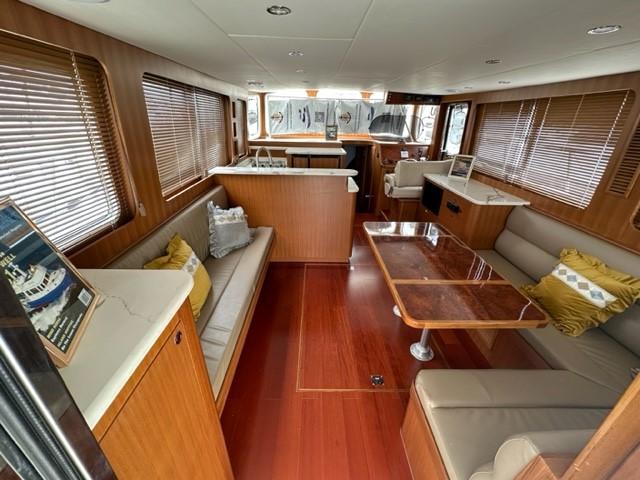 Luxurious 2025 Bracewell 41 yacht interior with elegant wood finishes and comfortable seating.
