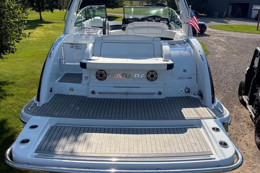 2015 Formula 350 Crossover Bowrider boat with spacious deck and sleek design.