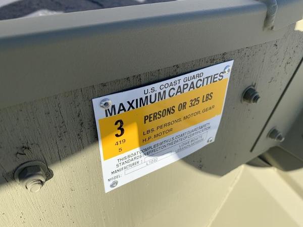 U.S. Coast Guard capacity label on 2024 Lowe L1040 Jon boat.