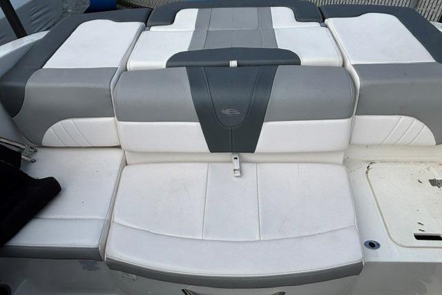2021 Chaparral 21 SSi boat seat, featuring gray and white cushioned upholstery.