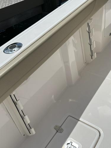 2019 Pursuit S 408 Sport boat interior detail with storage compartments.
