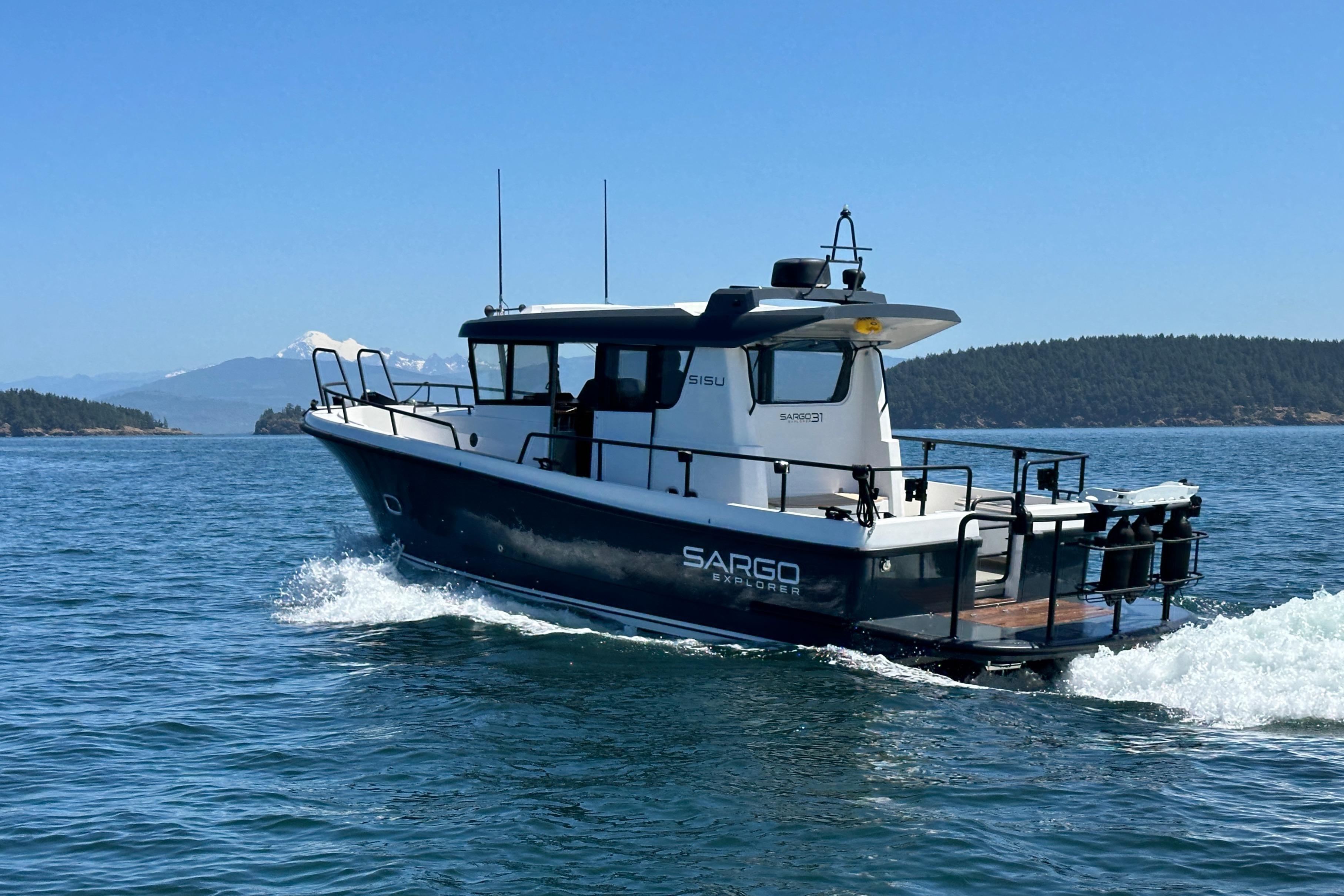 Sargo 31 boat cruising on a clear blue sea, 2020 model.