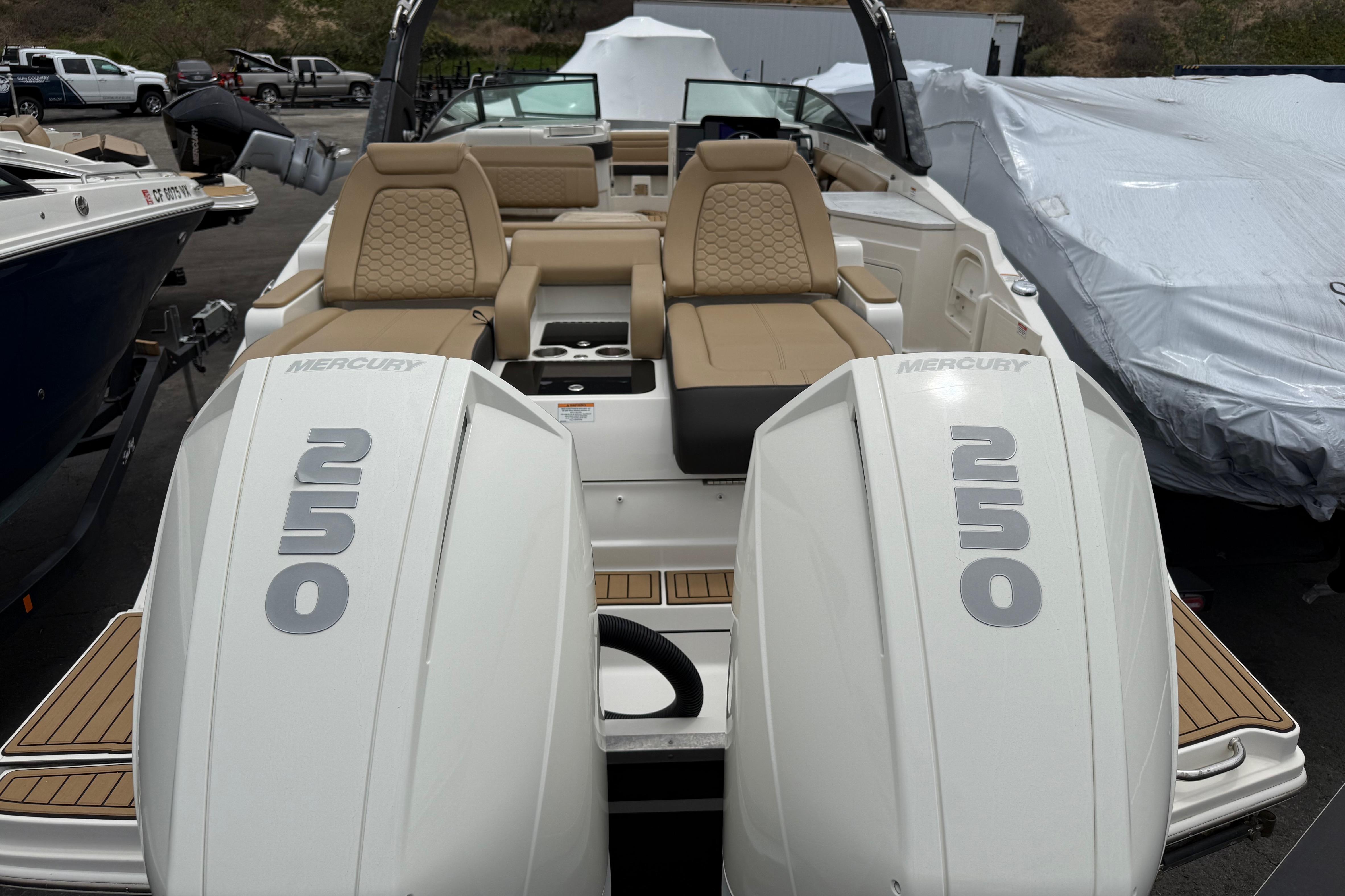 2022 Sea Ray SDX 290 Outboard with twin Mercury 250 engines, beige seating.