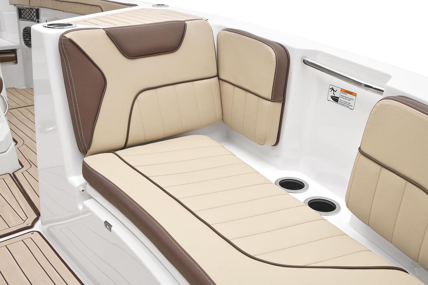 Manufacturer Provided Image: 2026 Yamaha Boats 222 FSH Sport E interior seating, featuring beige and brown cushioned design.