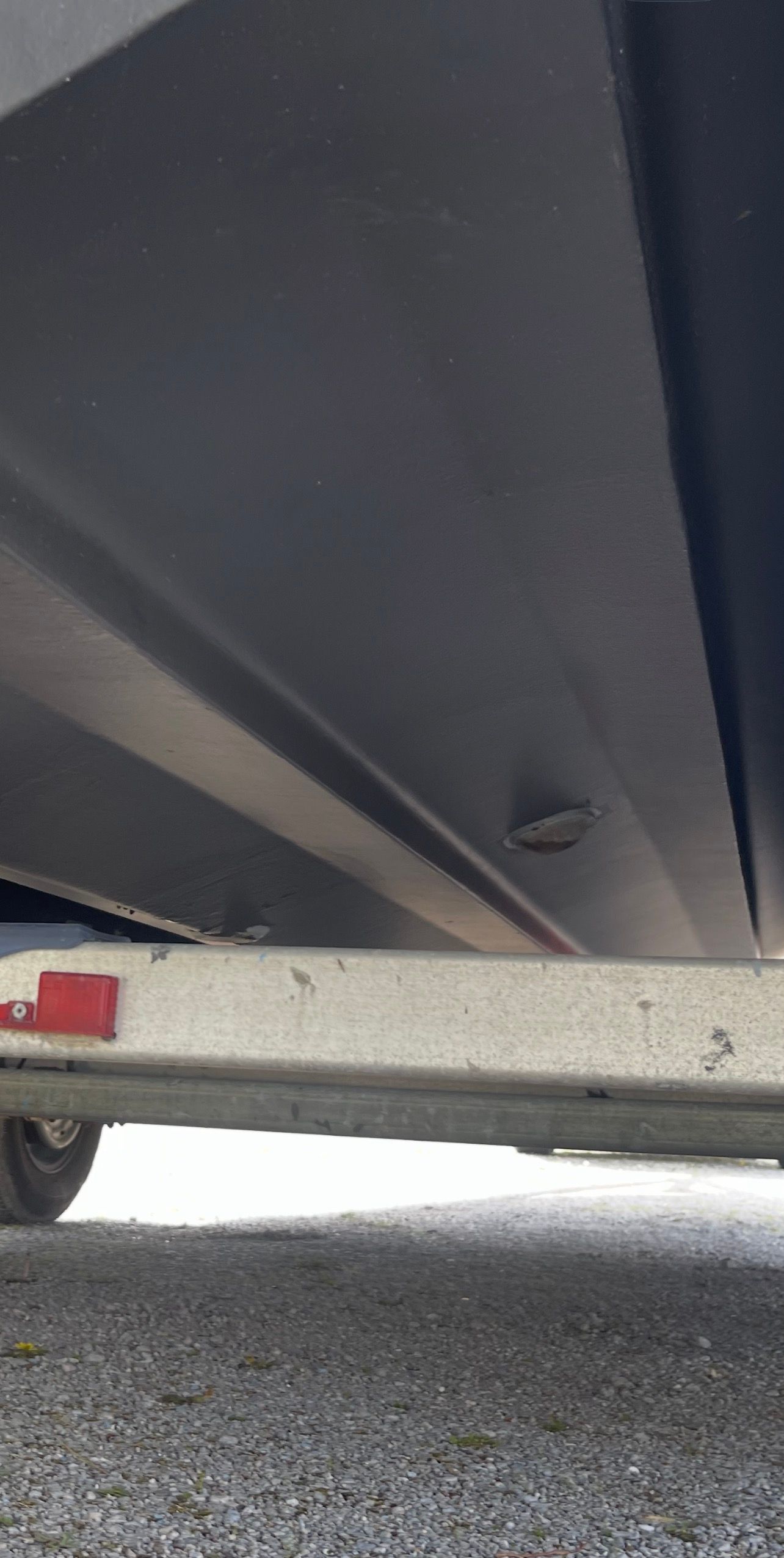 Underside of a 2006 Sea Ray 270 Amberjack boat on trailer.
