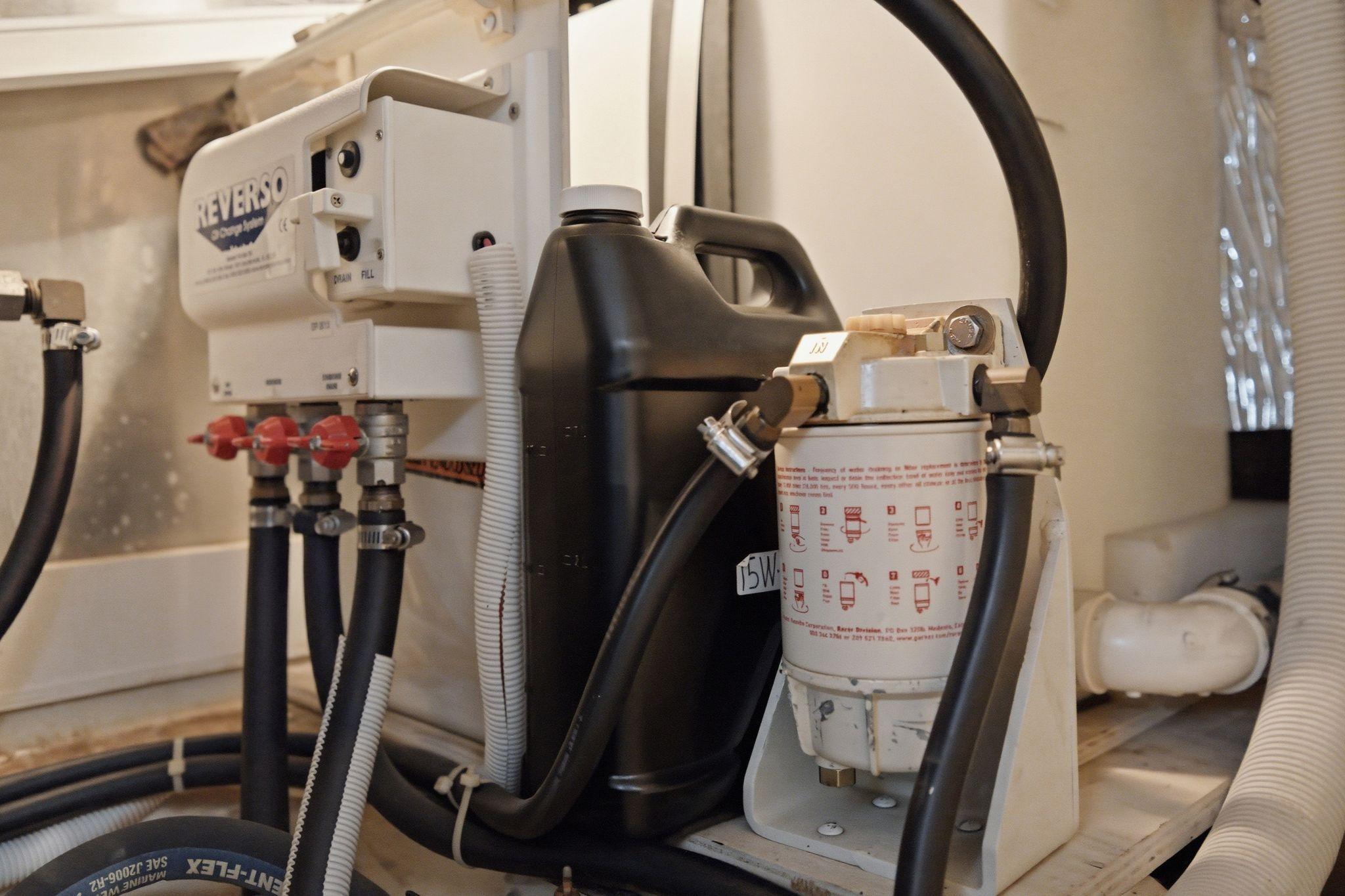 Engine room of 2005 Carver 39 Motor Yacht with Reverso oil change system.