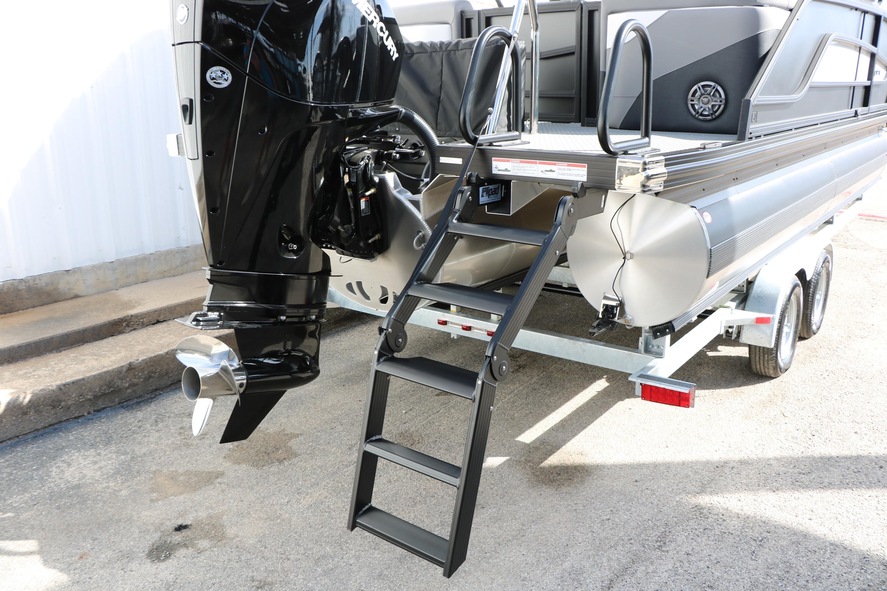 2026 Evotti 521QL pontoon boat with outboard motor and trailer, featuring a rear ladder.