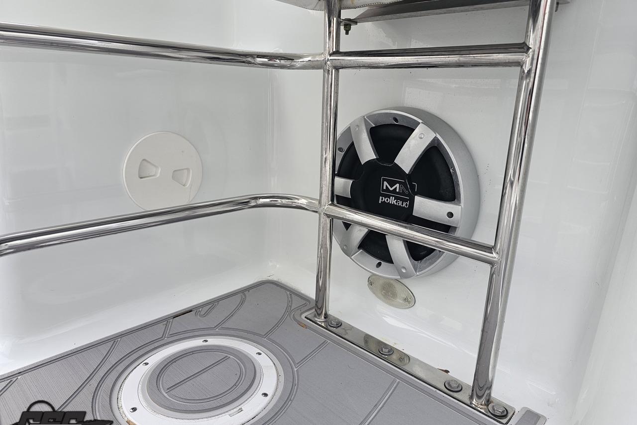 2008 Baja 335 Performance boat interior with Polk Audio speaker and stainless steel railing.