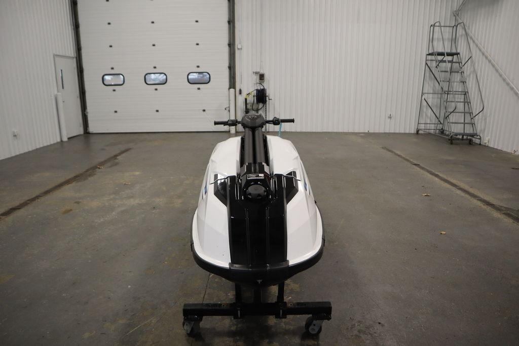 2025 Yamaha WaveRunner SuperJet in a spacious indoor garage setting.