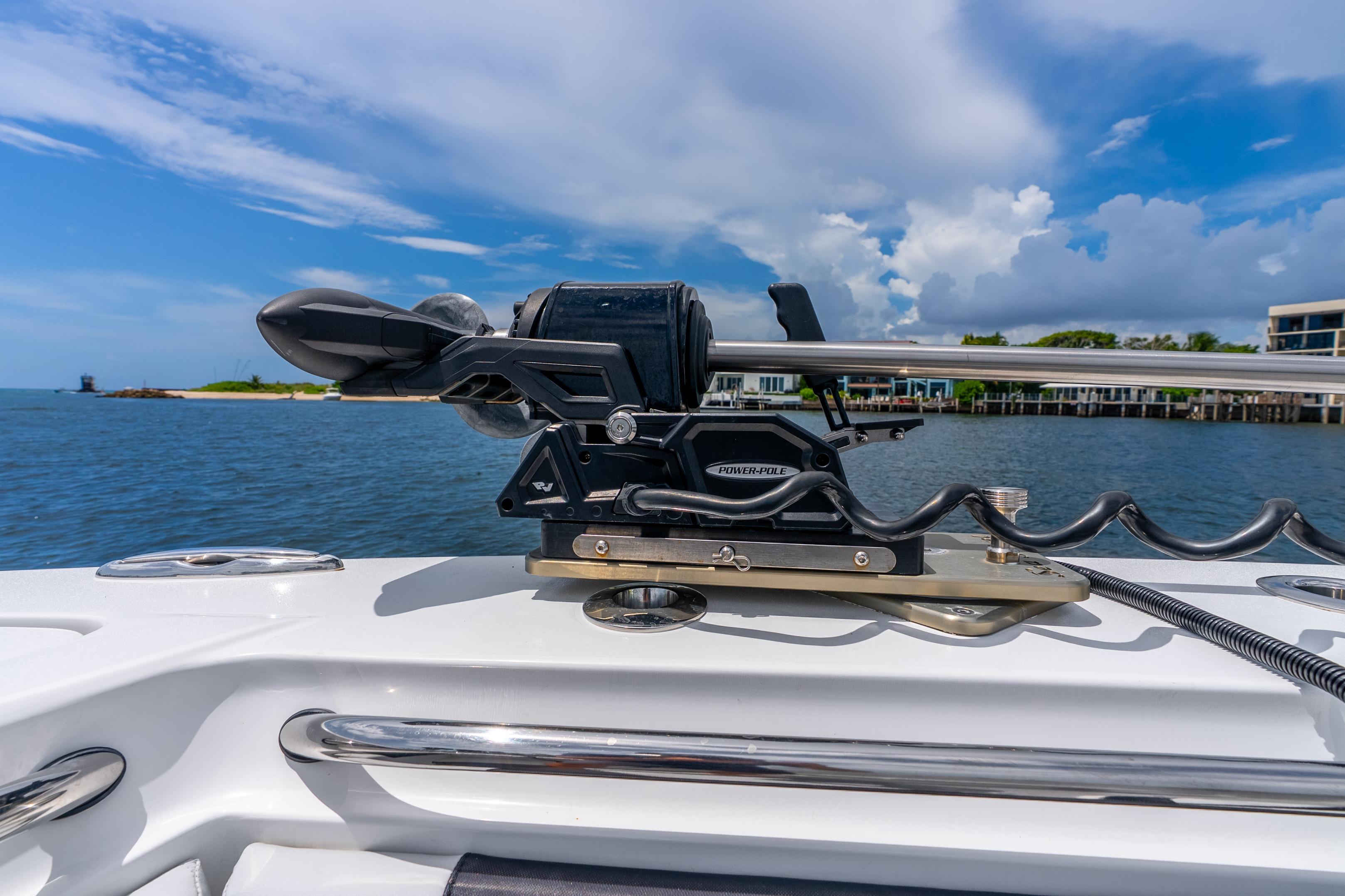 2024 Nor-Tech 452 Super Fish boat with Power-Pole anchor system on calm waters.