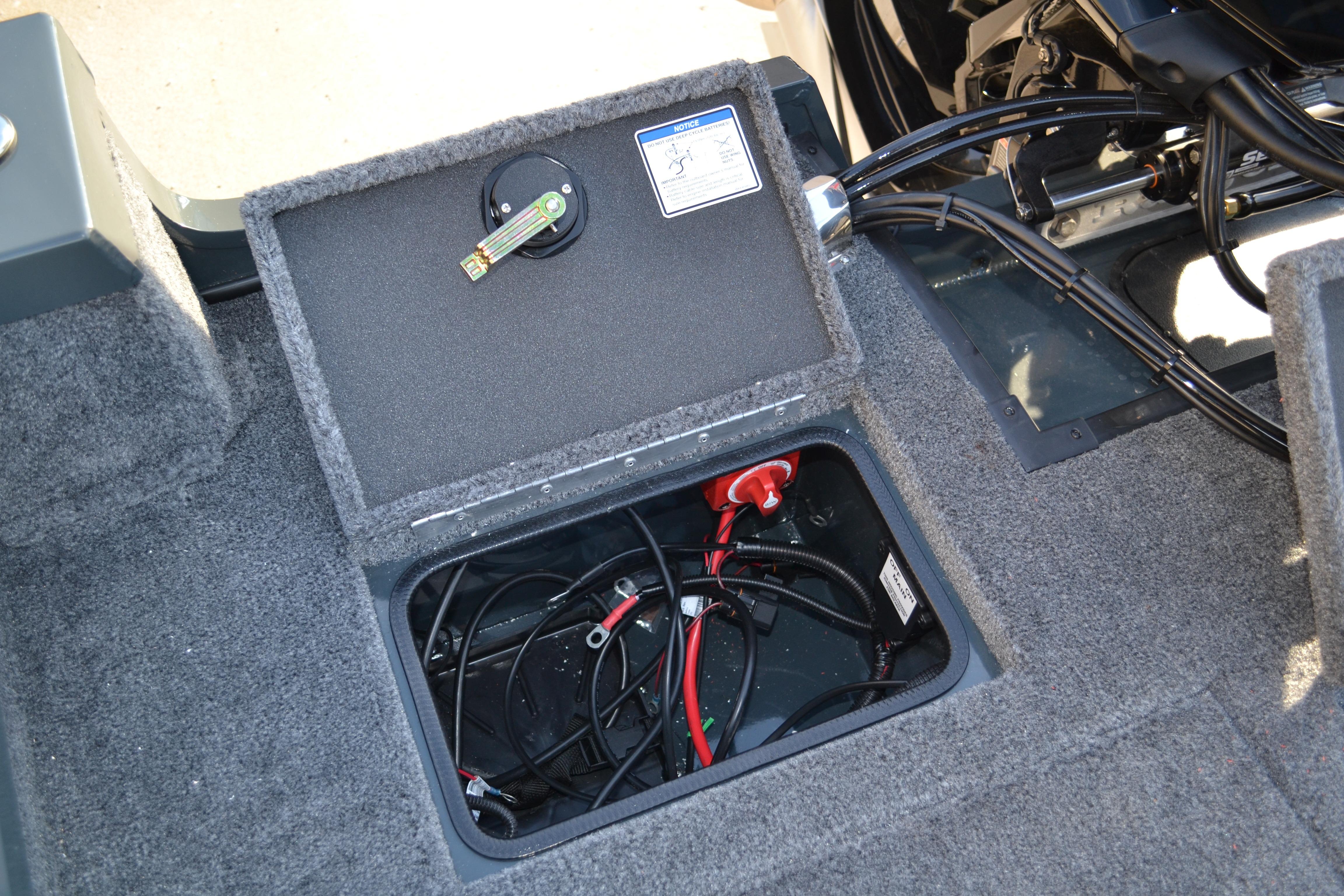 2026 Ranger VS1882SC Reata boat battery compartment with wiring and connections.
