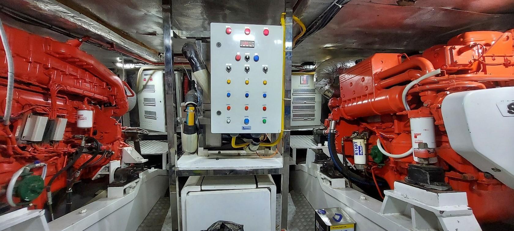 Engine room of a 2012 Ketch 37 m yacht with control panel and machinery.