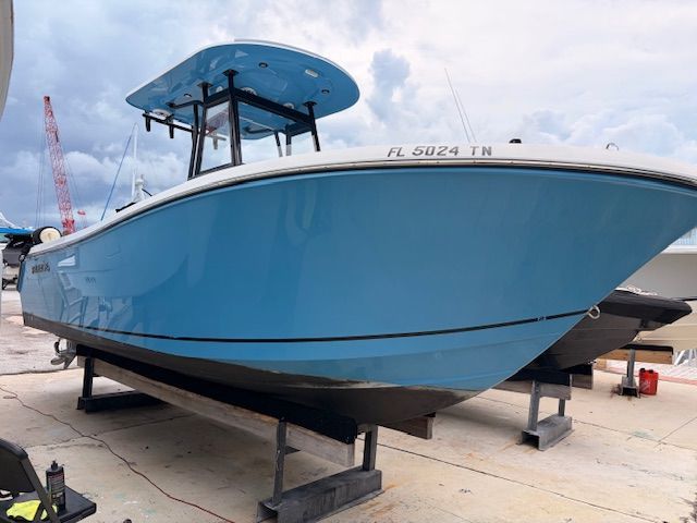 Blue Release 240 RX 2022 boat on a dry dock.