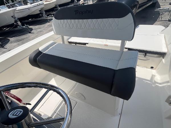 2022 Bayliner Trophy T22CC boat seat and steering wheel, showcasing modern design and comfort.