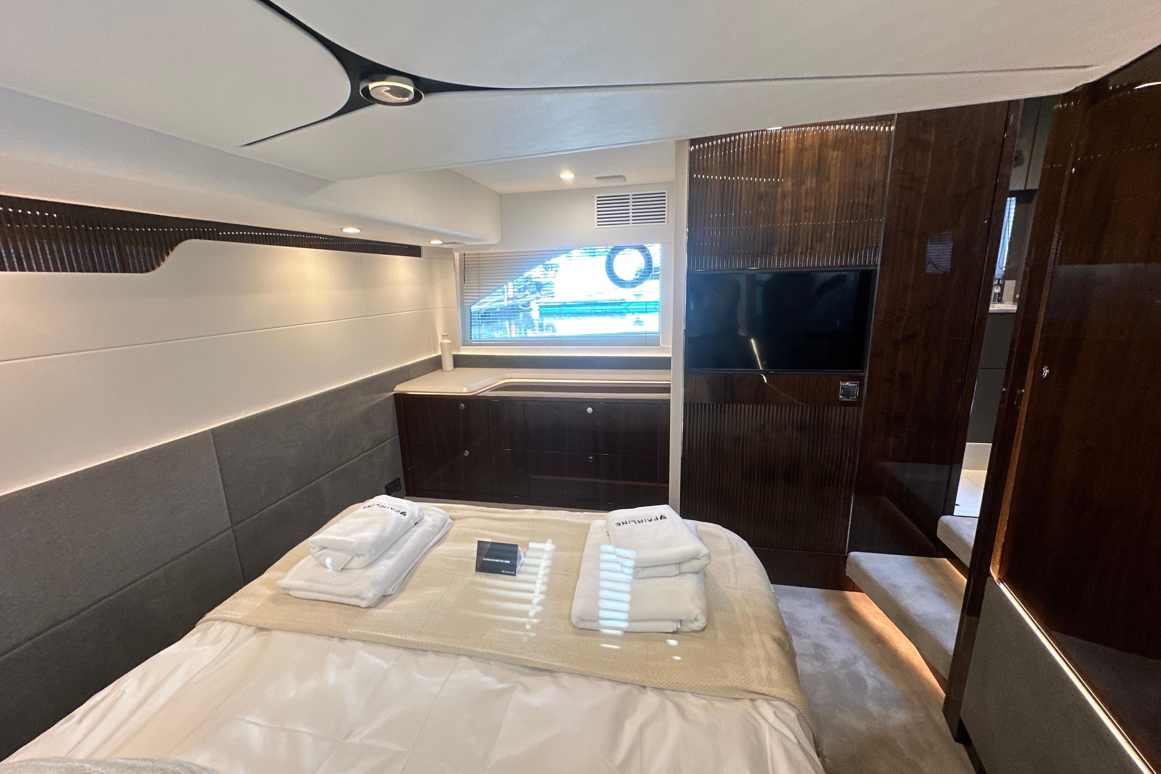 Luxurious interior cabin of 2026 Fairline Targa 47 GT yacht with modern amenities.