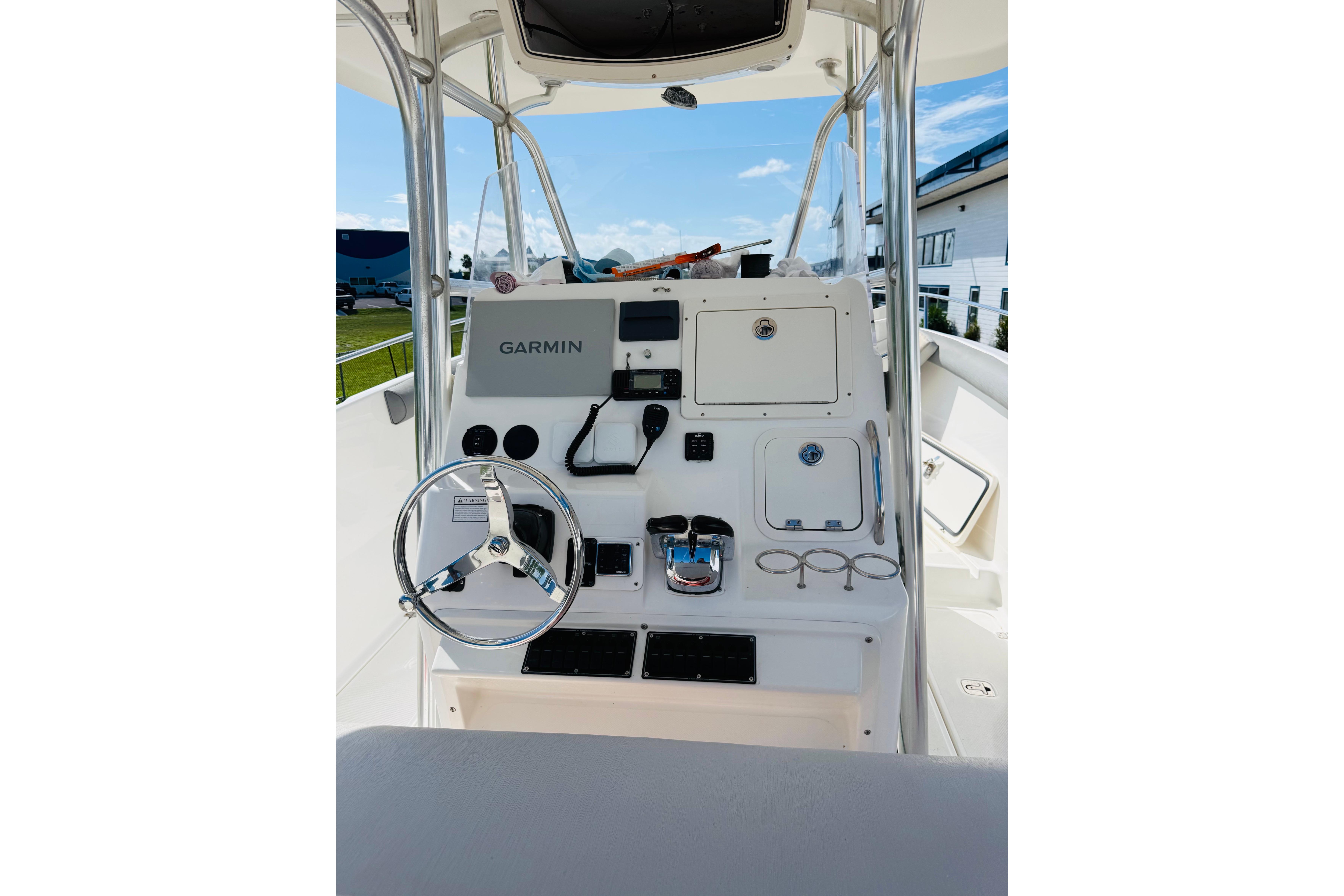 Century 3200 Center Console 2005 boat dashboard with Garmin navigation system.