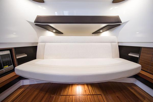 Manufacturer Provided Image: Interior seating of 2018 Pursuit S 368 Sport boat with wooden flooring.