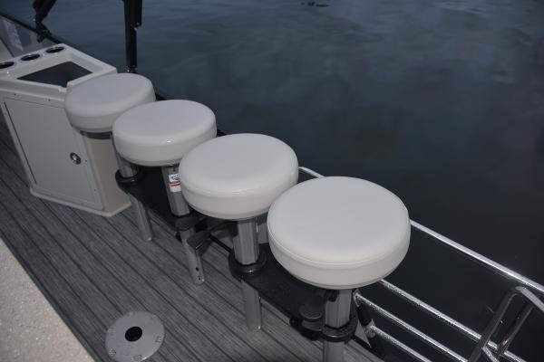 Manufacturer Provided Image: Four white bar stools on a 2022 Sylvan L3 DLZ Bar pontoon boat.