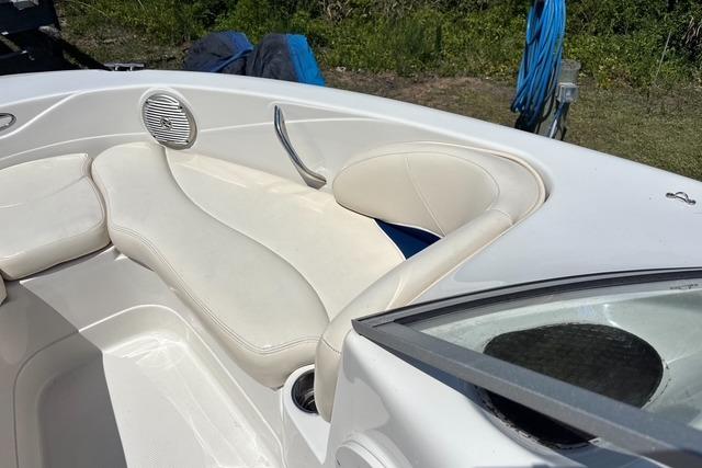 2012 Tahoe Q8 SSi boat interior with white seating and speaker detail.