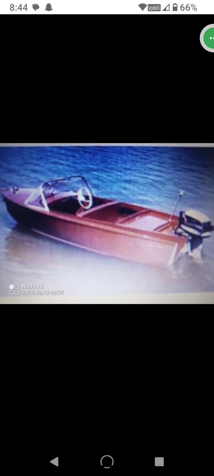 1957 Chris-Craft Comet boat on the water.