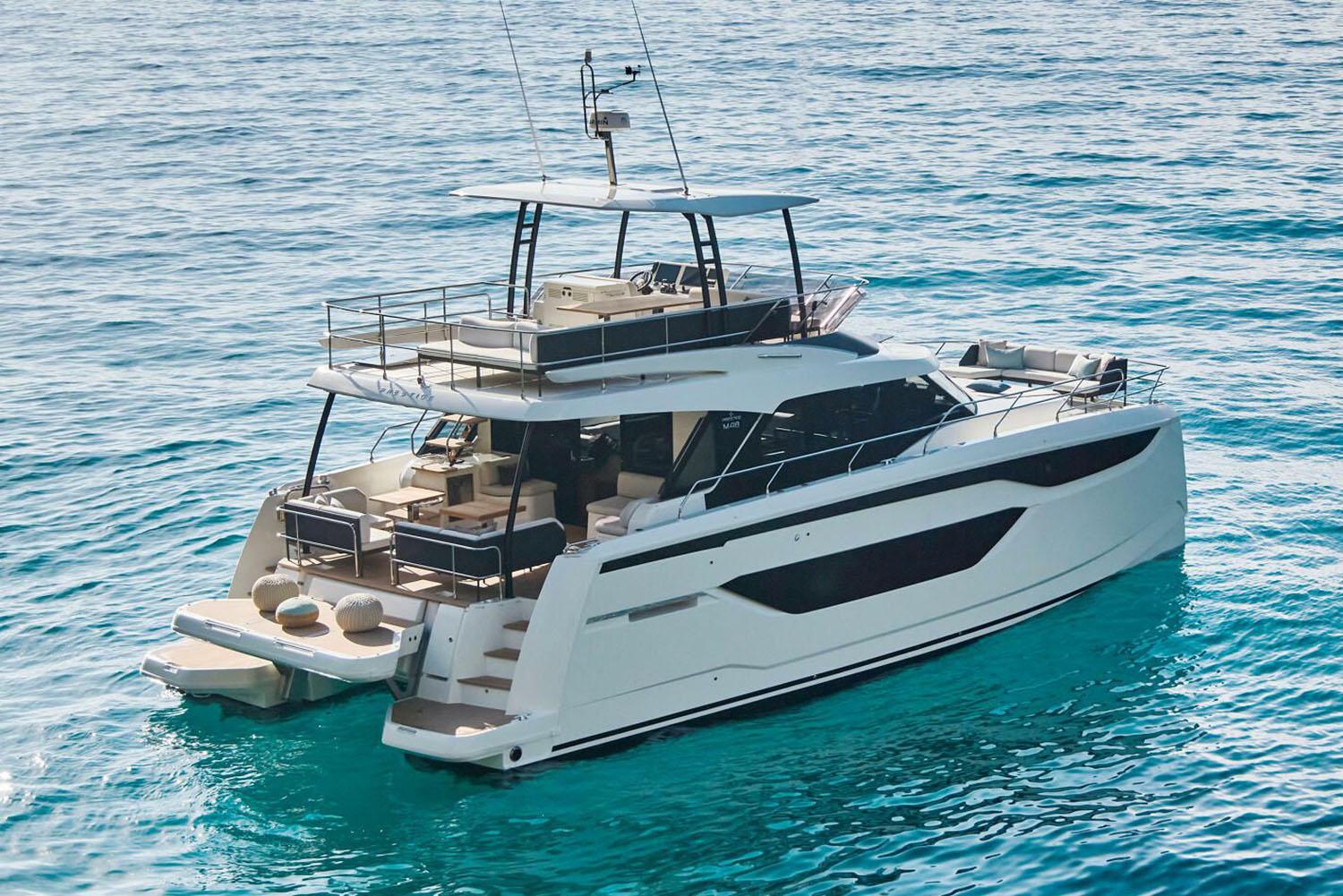 Manufacturer Provided Image: Luxury Prestige M48 yacht cruising on clear blue waters, 2025 model.