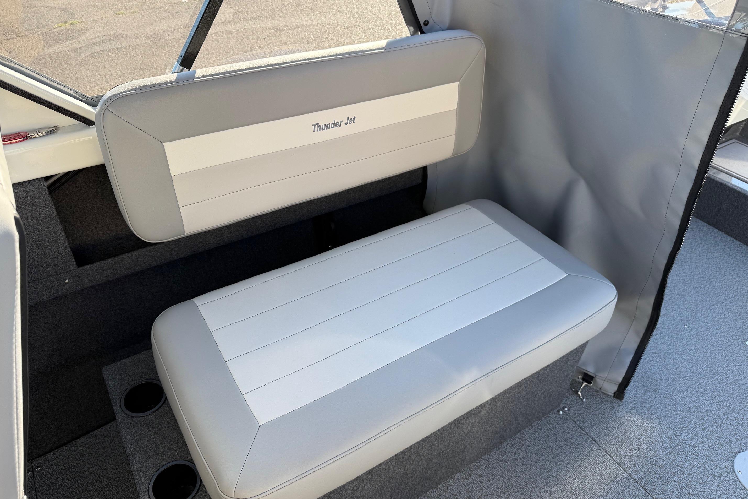 2026 Thunder Jet 185 Luxor boat interior with gray seating and cup holders.