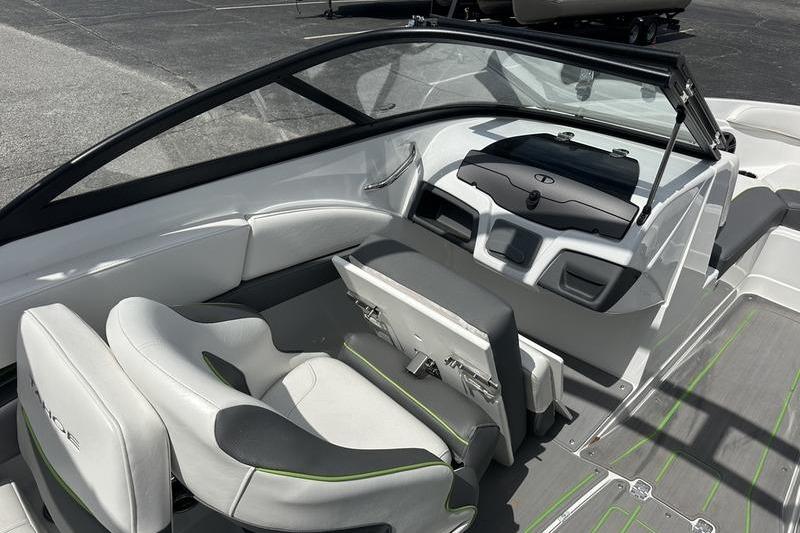 2024 Tahoe 210 S boat interior with modern seating and sleek dashboard design.