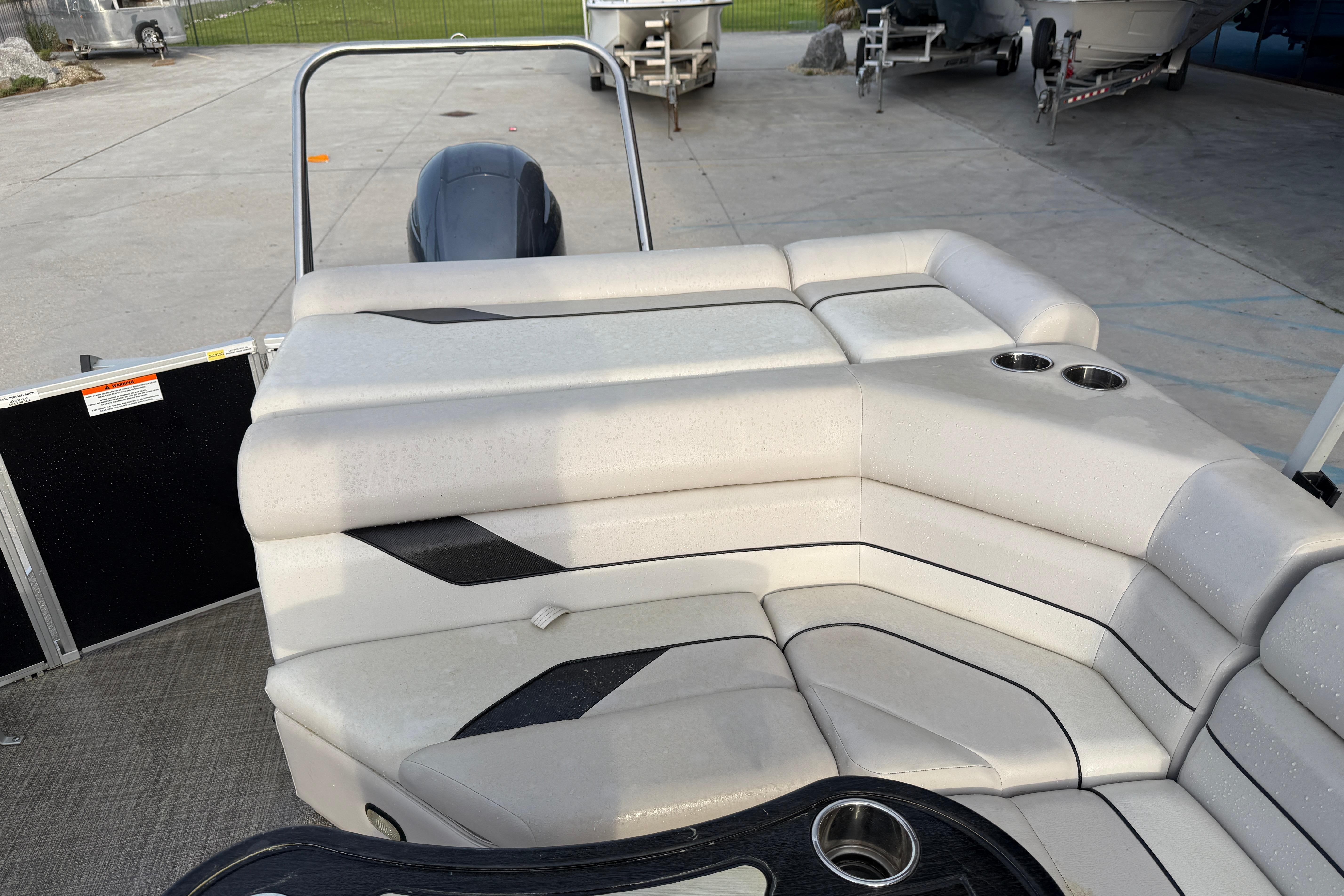 2022 Custom G3 Suncatcher 322FC pontoon boat with spacious seating and cup holders.