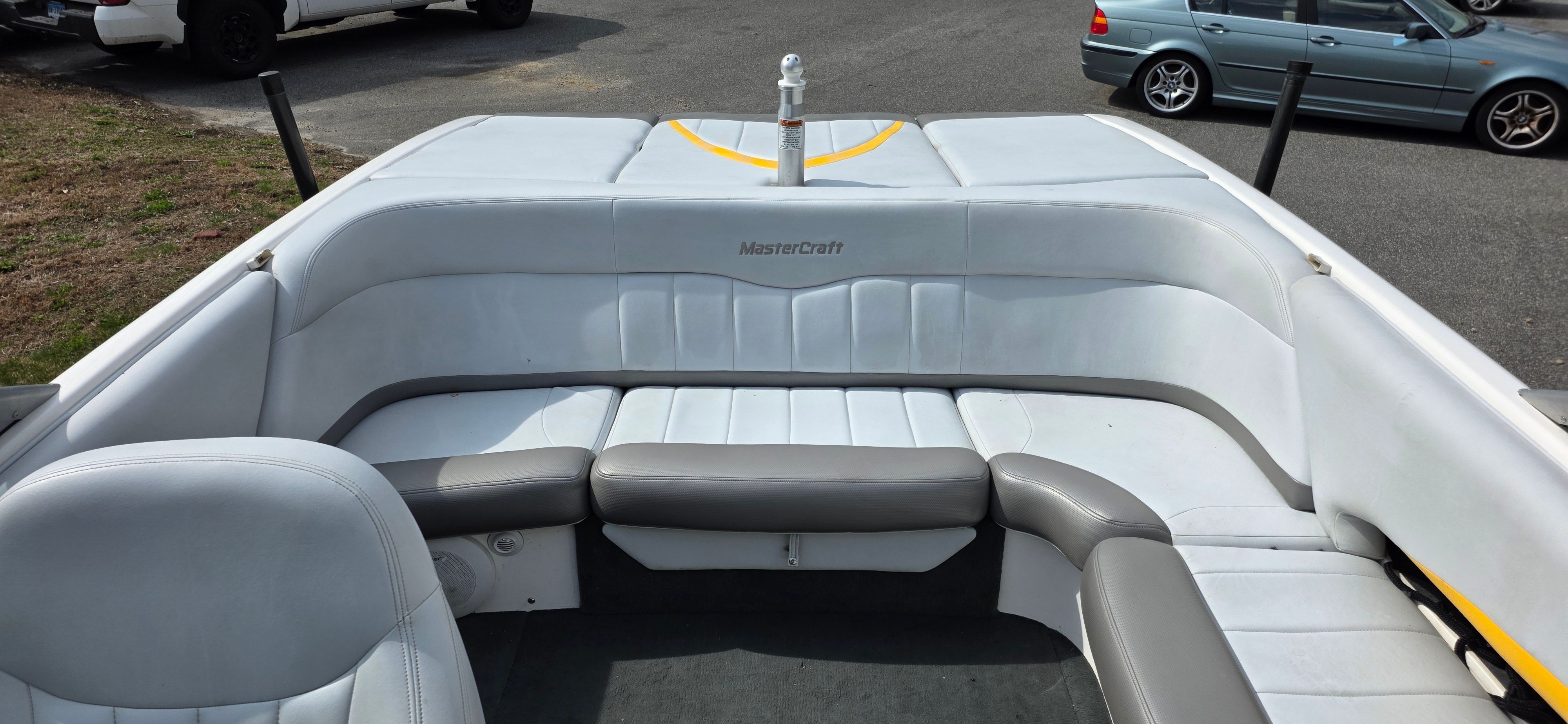 Interior of a 2004 MasterCraft Maristar boat with gray seating.