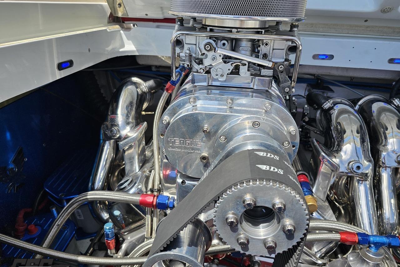 Close-up of a 2002 Formula 382 FASTech engine with polished components and BDS supercharger.