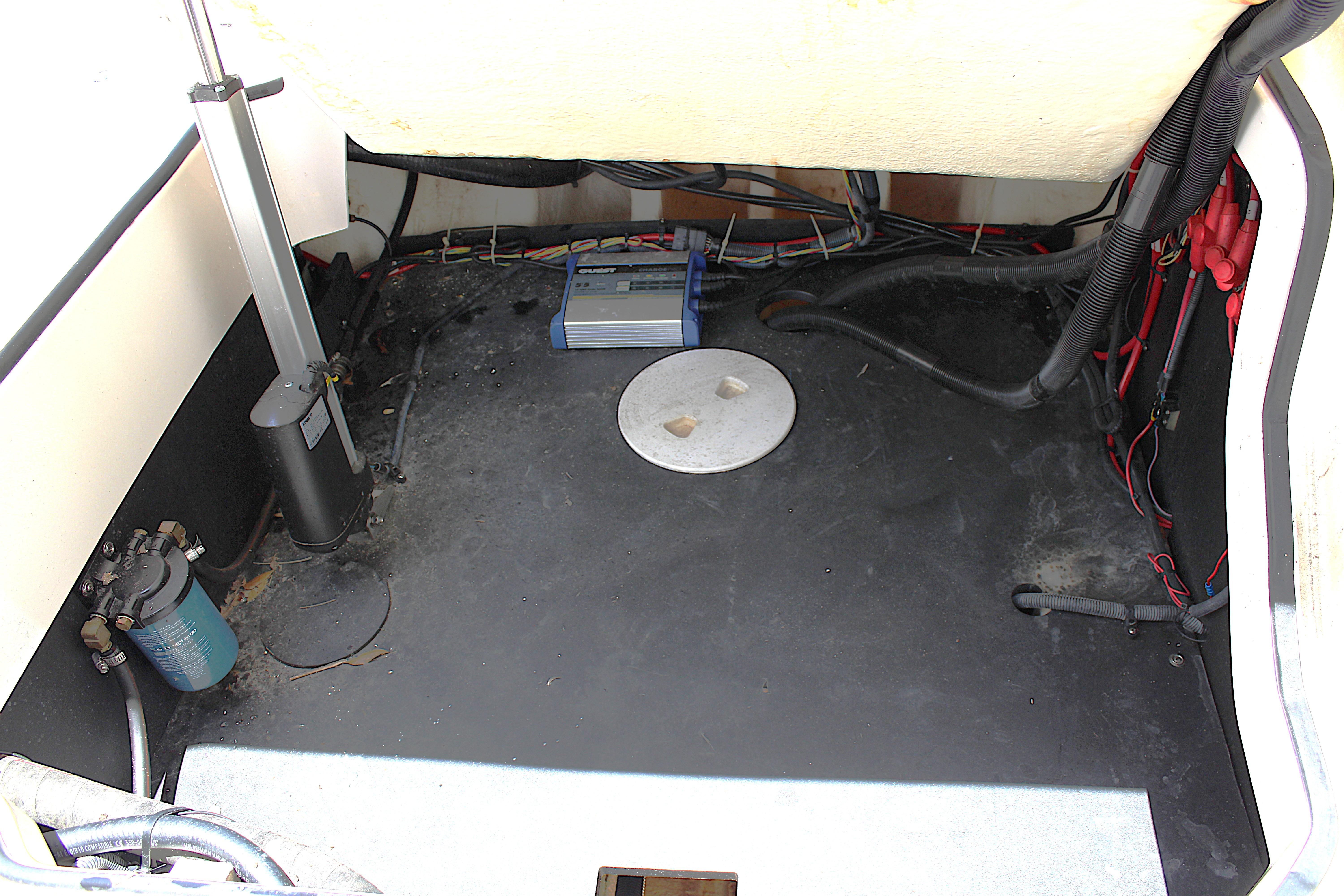 2021 Regal 26 OBX boat engine compartment with wiring and components.