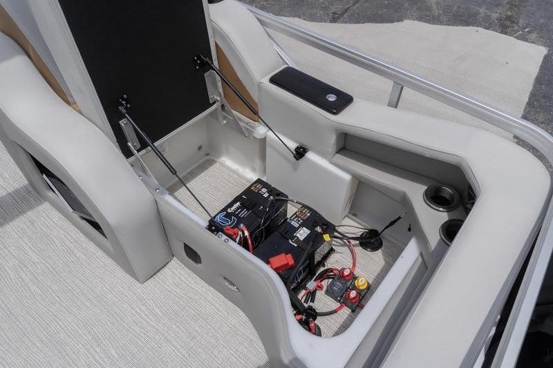 2026 SunCatcher Elite 326 SS boat interior showing battery compartment and wiring setup.