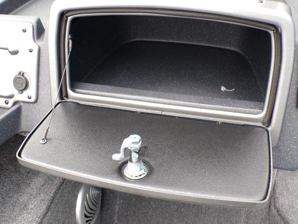 2025 Tracker Pro Guide V-175 Combo boat glove compartment with open lid and latch.