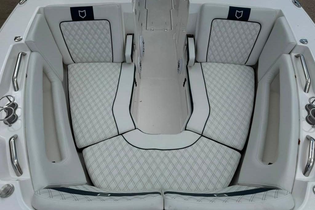 Luxurious seating area on 2026 Sea Fox 288 Traveler boat with diamond-pattern upholstery.