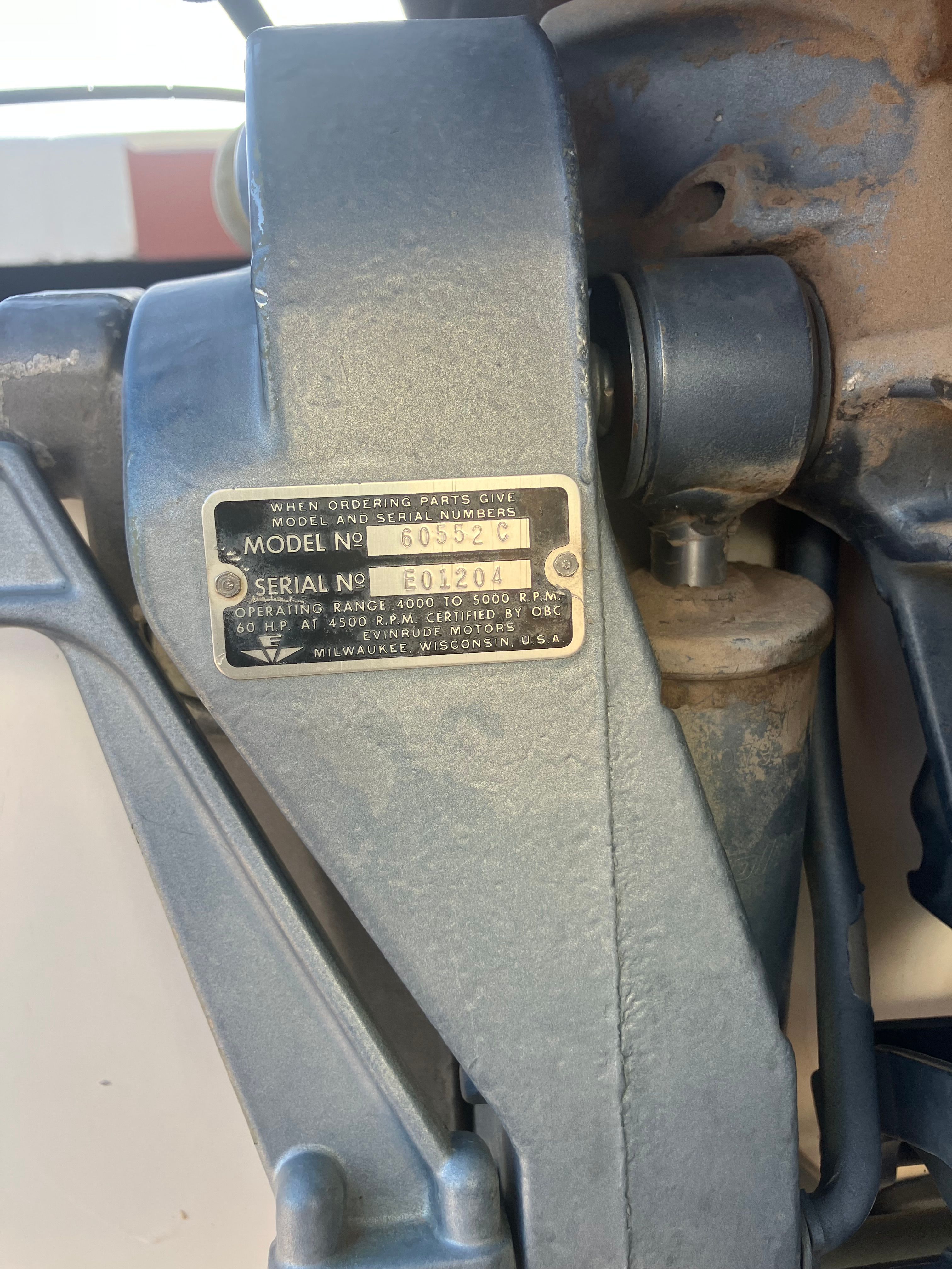 Close-up of a 1958 Hydroswift Runabout with a serial number plate.