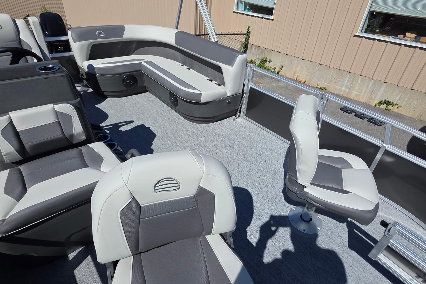 2026 Sun Tracker BB 16 XLS pontoon boat interior with gray seating and carpeted floor.