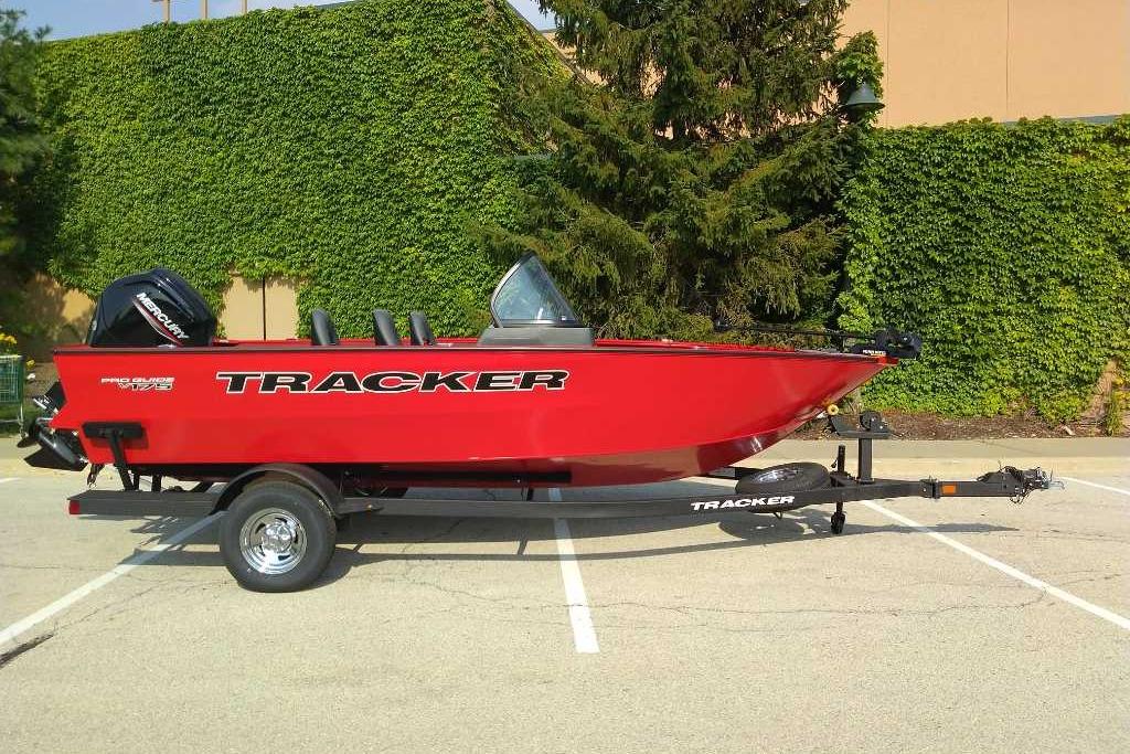 2026 Tracker Pro Guide V-175 WT boat in vibrant red on a trailer.