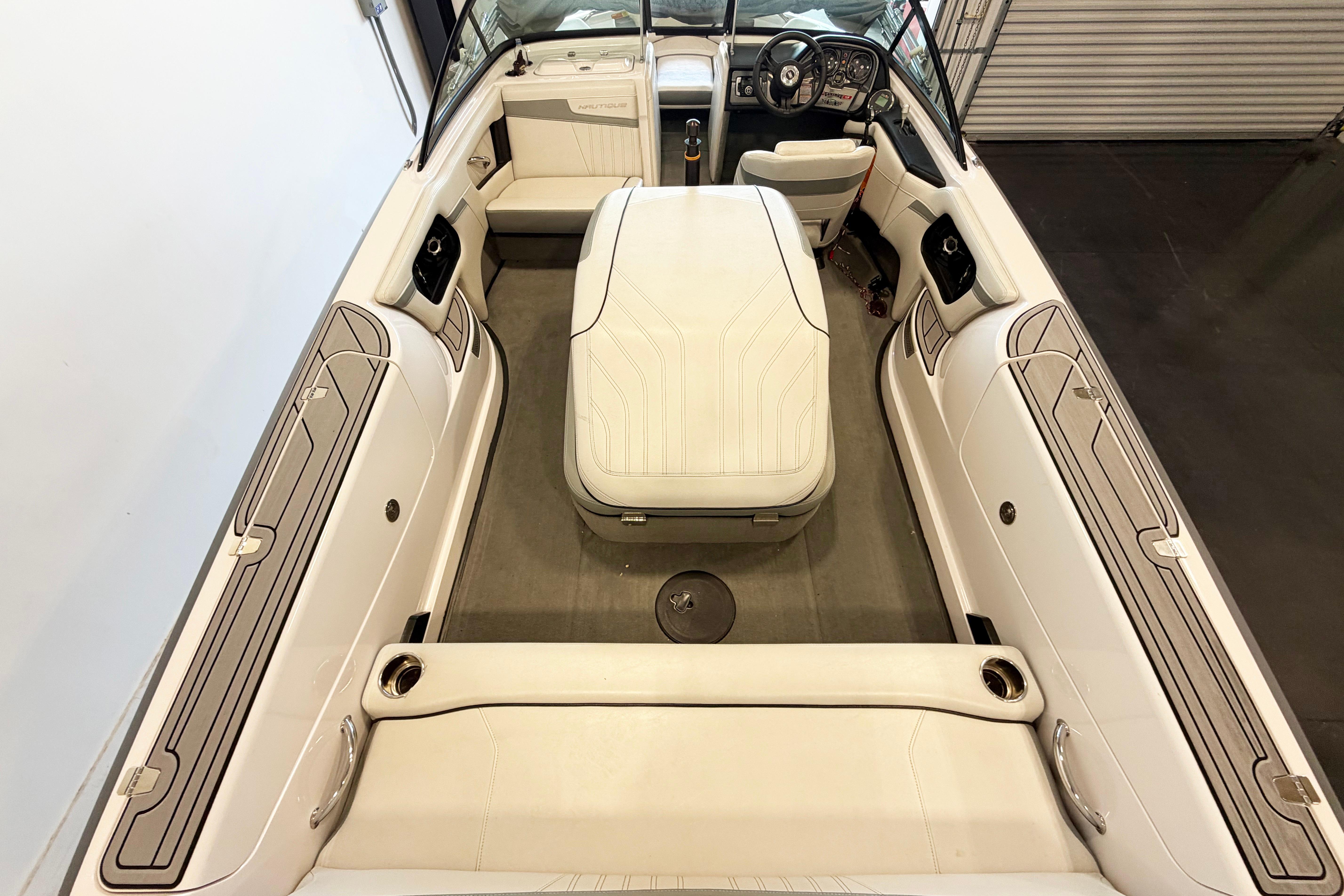 2014 Nautique Ski Nautique 200 Open Bow interior with white seating and sleek design.