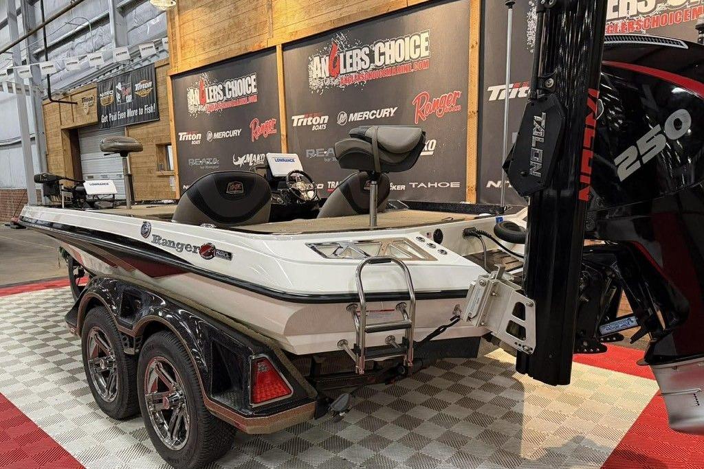 2020 Ranger Z520L boat displayed indoors with powerful engine and sleek design.