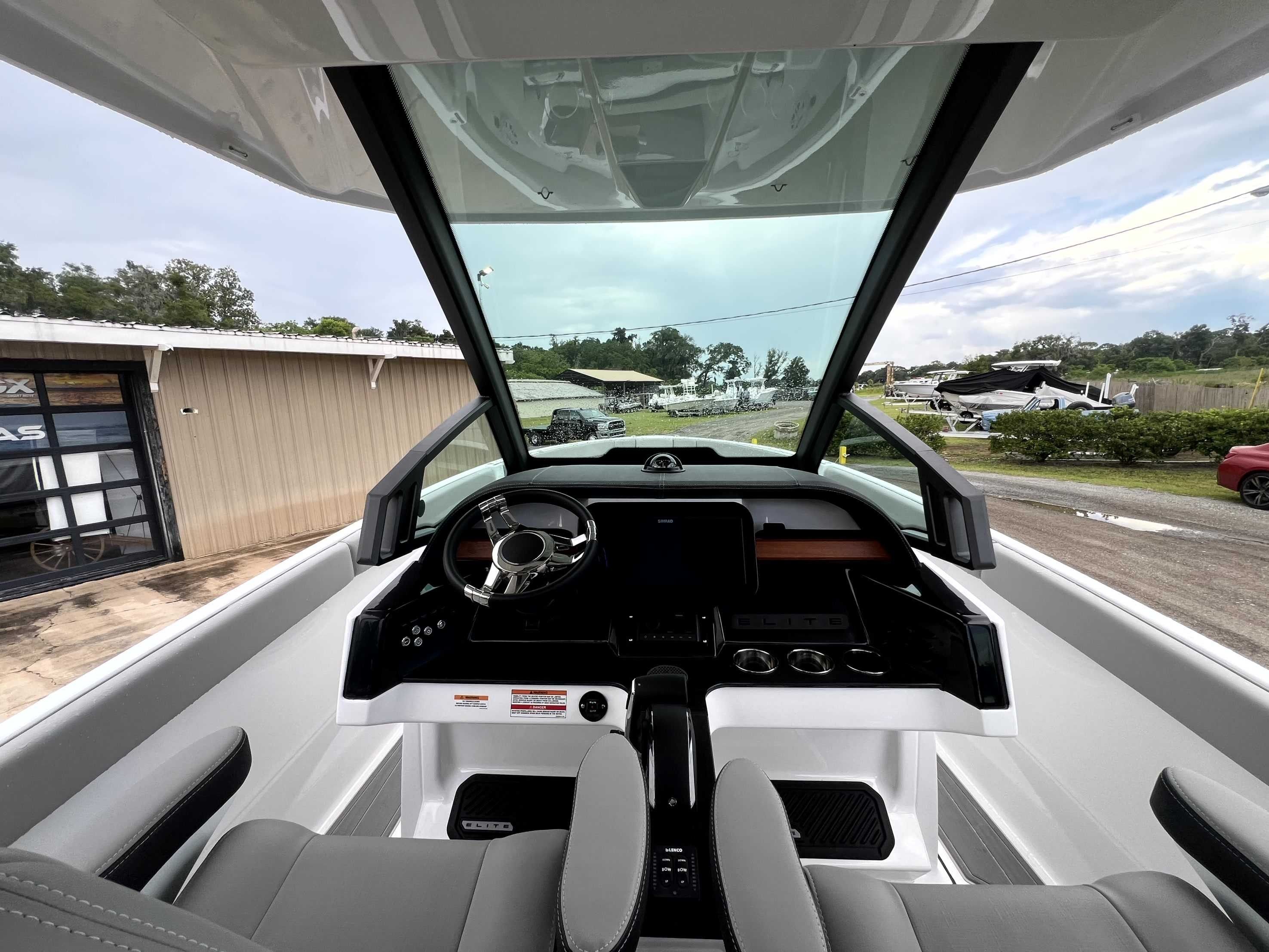 The cockpit of the 2026 Monterey Elite 25 features a modern design with a large steering wheel and digital display.
